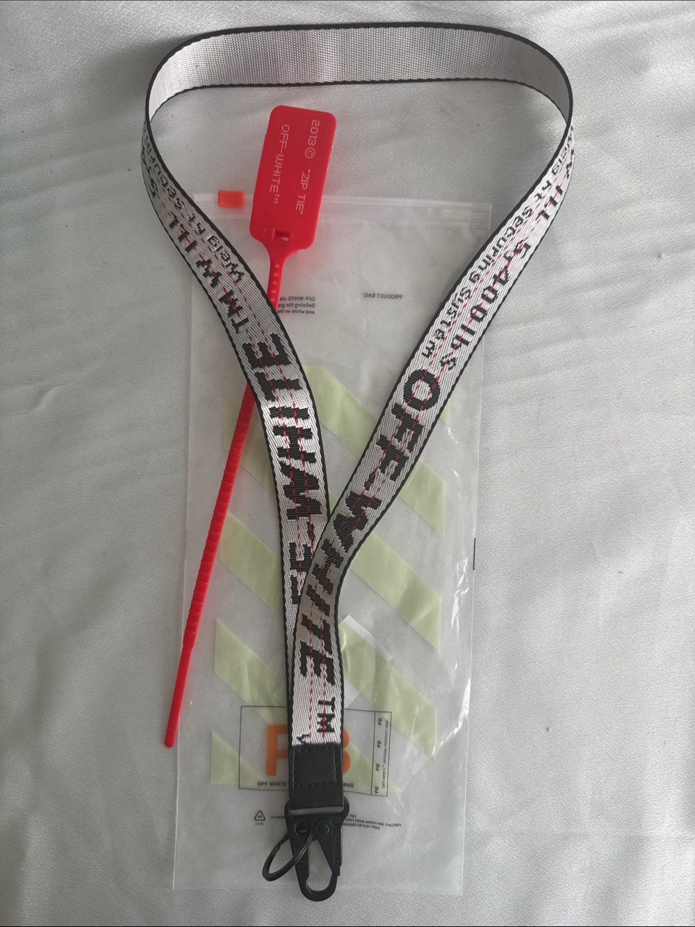 New! Off-White white and black Industrial Strap Lanyard with Red Tag